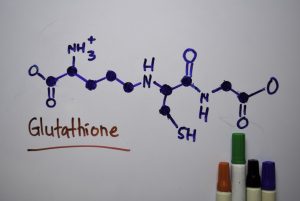 Liposomal Glutathione molecular diagram on whiteboard