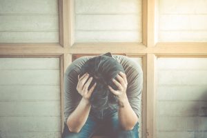 man delign with depression and anxiety